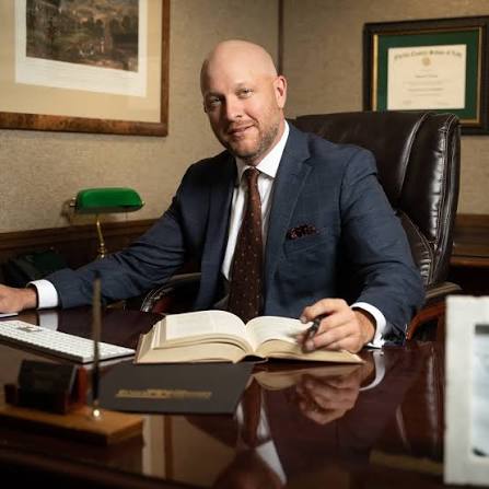 Thomas J. Nessler at his desk
